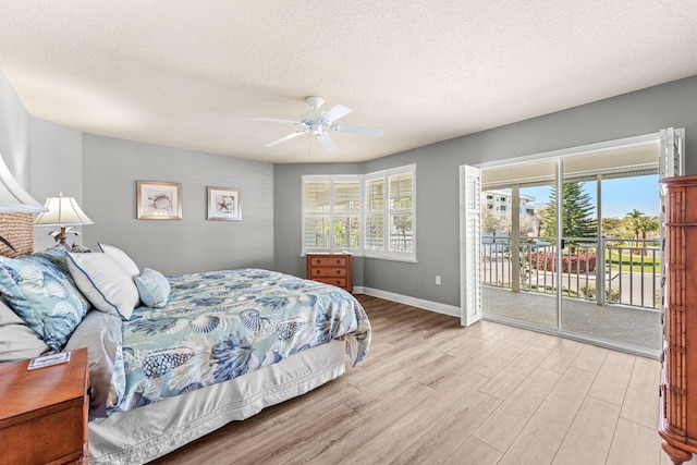 bedroom with access to exterior, light wood finished floors, ceiling fan, a textured ceiling, and baseboards