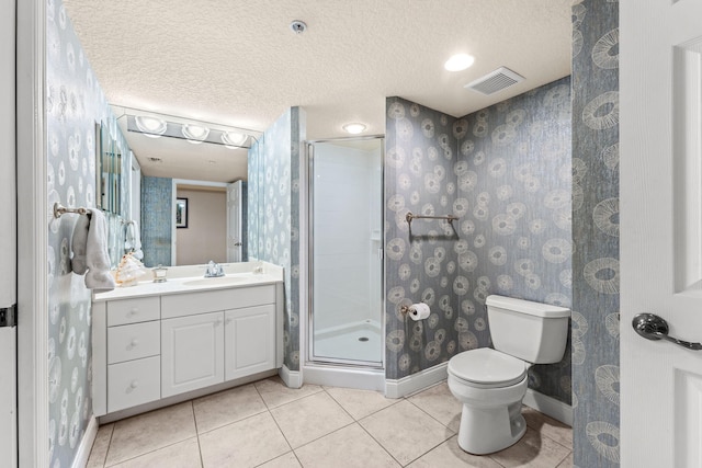 bathroom featuring wallpapered walls, a stall shower, visible vents, tile patterned flooring, and a textured ceiling