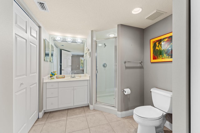 full bath with toilet, tile patterned flooring, visible vents, and a shower stall