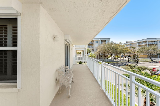 balcony featuring a residential view