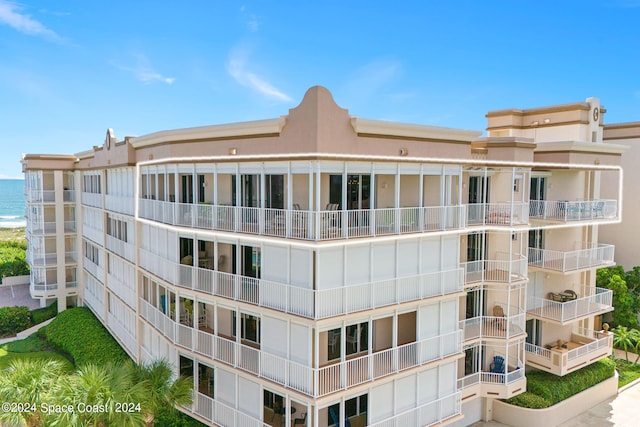 view of building exterior featuring a water view