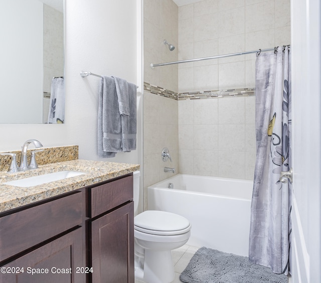 full bathroom with vanity, tile patterned floors, toilet, and shower / tub combo with curtain