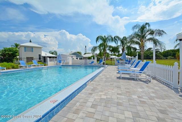 view of pool featuring a patio area