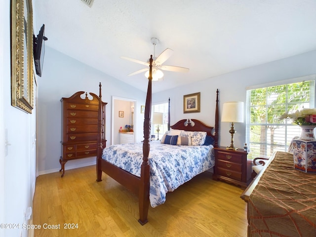 bedroom featuring lofted ceiling, ceiling fan, and light hardwood / wood-style floors