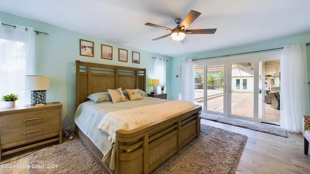 bedroom with access to outside, ceiling fan, and light hardwood / wood-style floors