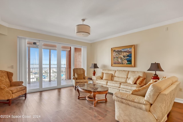 living room featuring ornamental molding and hardwood / wood-style flooring