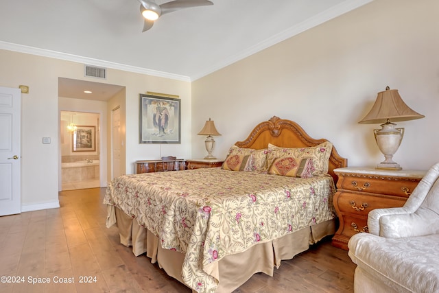 bedroom featuring ensuite bath, ornamental molding, ceiling fan, and light hardwood / wood-style floors