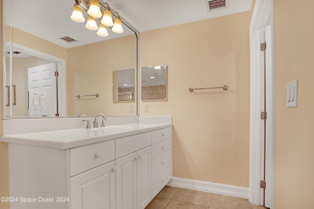 bathroom featuring vanity and tile patterned flooring