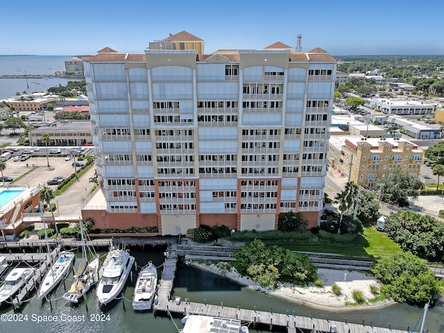 view of building exterior featuring a water view