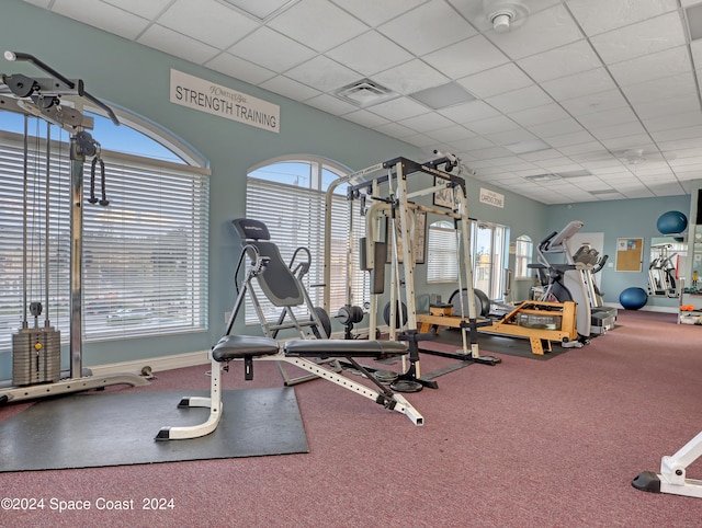 gym with a drop ceiling