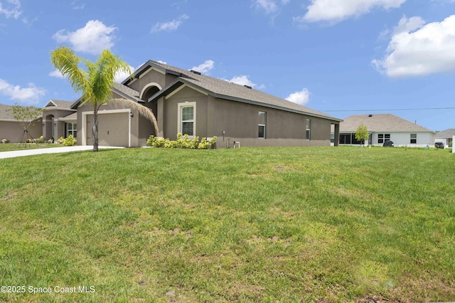 539 Hamwood St SW, Palm Bay, FL 32908 - view of front of property with stucco siding, a garage, concrete driveway, and a front lawn