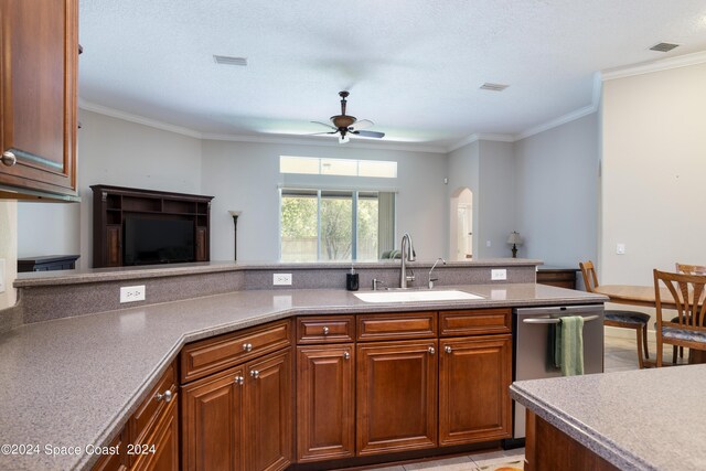 kitchen with crown molding, a textured ceiling, sink, ceiling fan, and stainless steel dishwasher