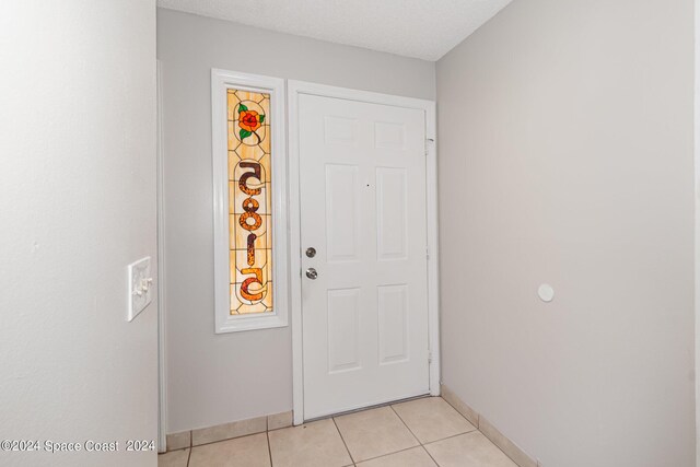 view of tiled foyer