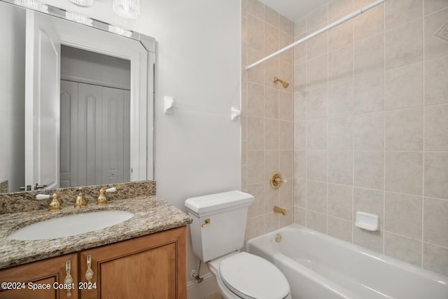 full bath with toilet, vanity, and shower / bath combination