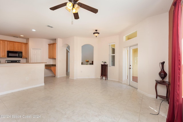 unfurnished living room with recessed lighting, visible vents, ceiling fan, and baseboards