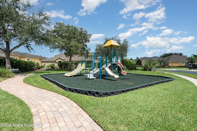 view of playground with a yard