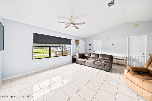 tiled living room with ceiling fan and vaulted ceiling