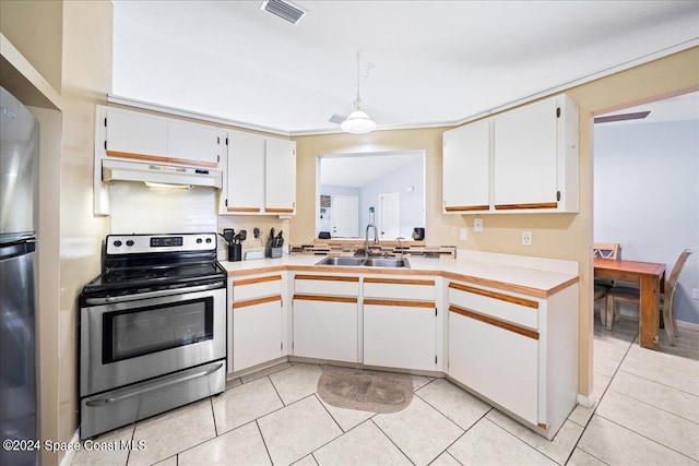 kitchen featuring sink, white cabinetry, stainless steel appliances, and light tile patterned flooring