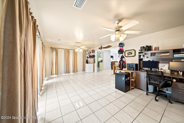 tiled office space with ceiling fan