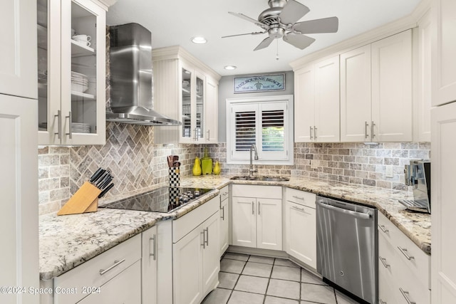 kitchen with light tile patterned flooring, black electric cooktop, a sink, wall chimney range hood, and dishwasher