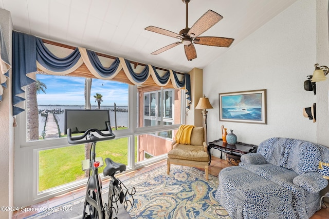 interior space with vaulted ceiling and ceiling fan