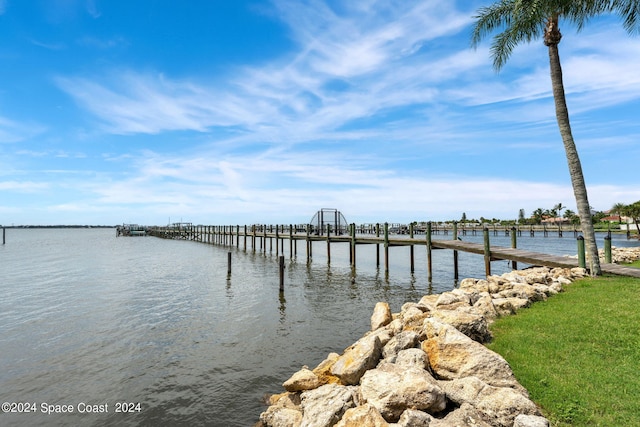 view of dock with a water view