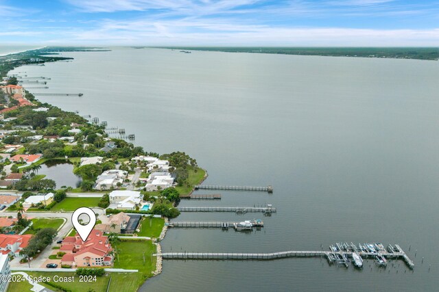 drone / aerial view featuring a water view