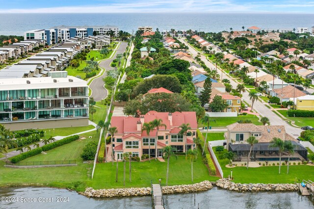 drone / aerial view featuring a water view