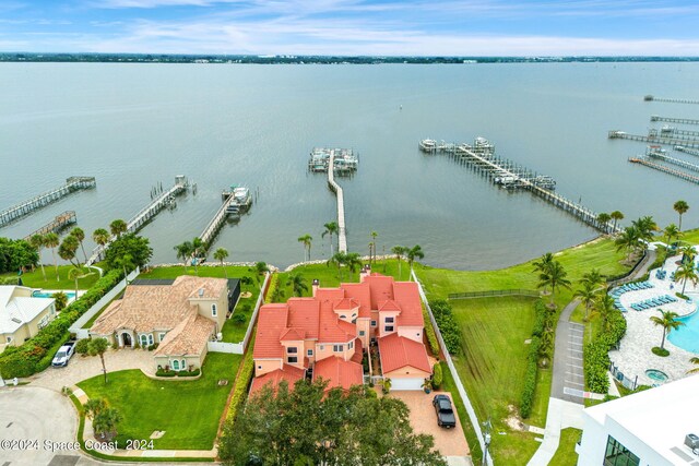 birds eye view of property featuring a water view