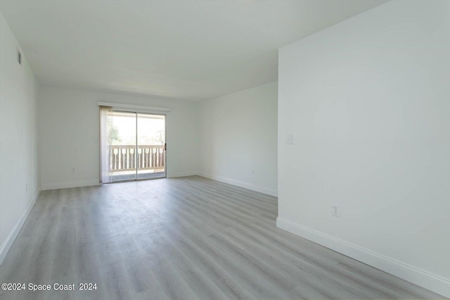 unfurnished room featuring light hardwood / wood-style flooring