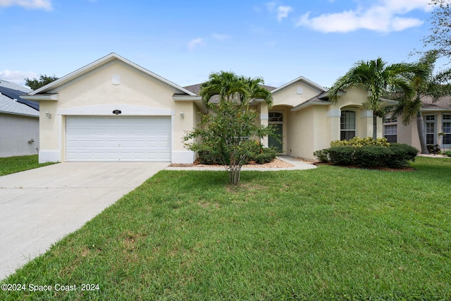 ranch-style home featuring a garage and a front lawn