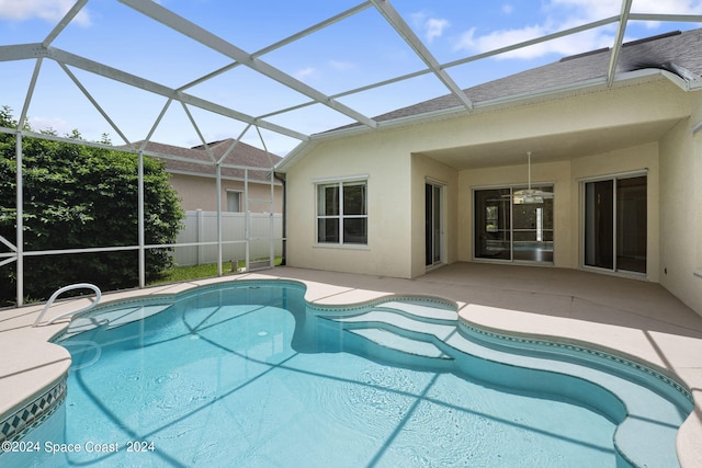 view of pool featuring a lanai and a patio area