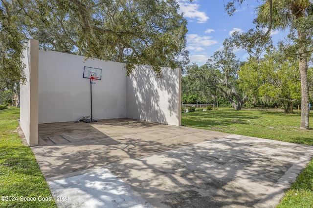 view of patio / terrace featuring basketball hoop