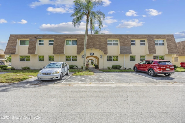 view of front of home with uncovered parking