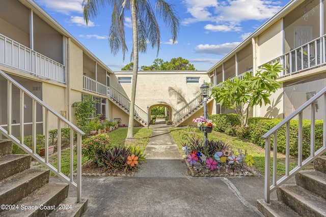 view of property's community featuring stairway