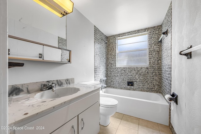 full bathroom featuring shower / tub combination, vanity, toilet, and tile patterned floors