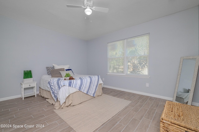 bedroom featuring ceiling fan and light hardwood / wood-style floors