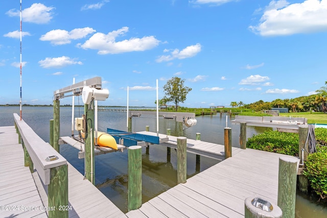 dock area with a water view