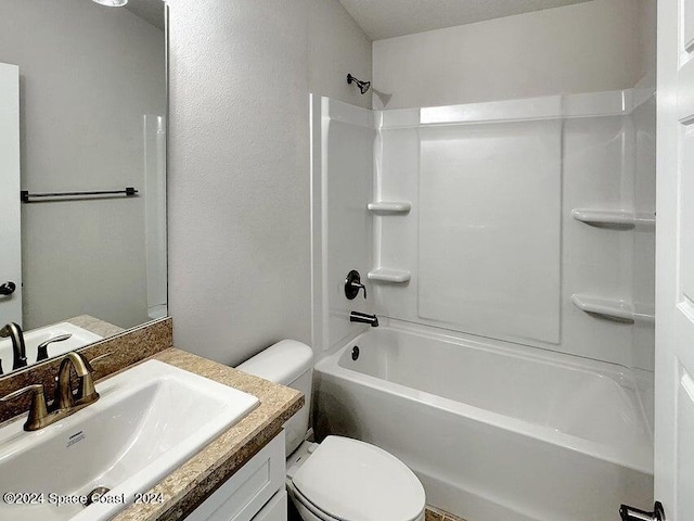 full bath with shower / tub combination, vanity, and toilet