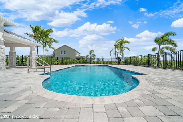 view of pool featuring a patio area