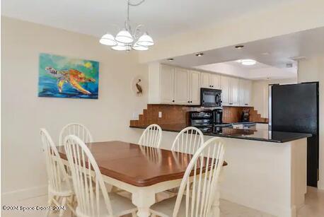 dining room featuring an inviting chandelier