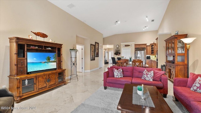 living room featuring lofted ceiling