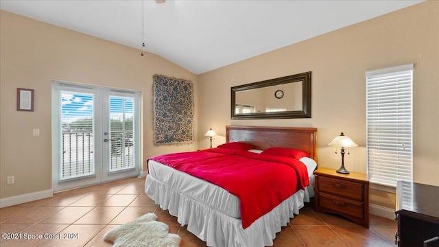 tiled bedroom featuring access to exterior and vaulted ceiling