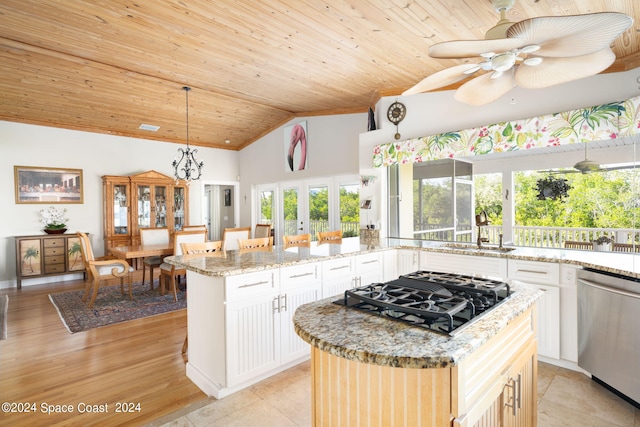 5280 95th St, Sebastian, FL 32958 - kitchen featuring a ceiling fan, dishwasher, high vaulted ceiling, black gas cooktop, and wooden ceiling