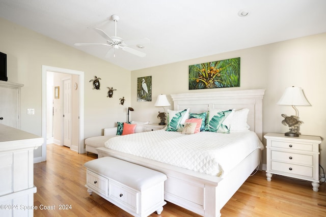5280 95th St, Sebastian, FL 32958 - bedroom featuring vaulted ceiling, light wood-style flooring, and ceiling fan