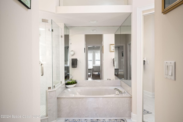 5280 95th St, Sebastian, FL 32958 - bathroom featuring a garden tub and a shower stall