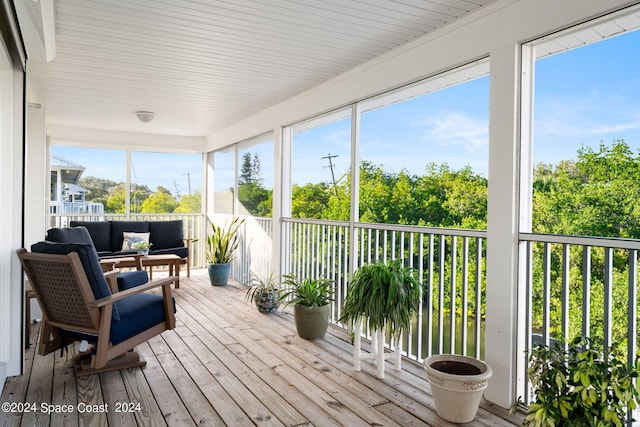 5280 95th St, Sebastian, FL 32958 - sunroom with an outdoor living space and hardwood / wood-style floors