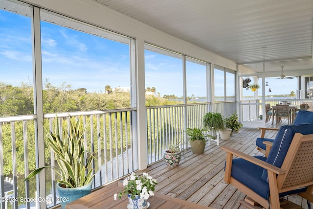 5280 95th St, Sebastian, FL 32958 - sunroom / solarium featuring ceiling fan, plenty of natural light, and outdoor dining space