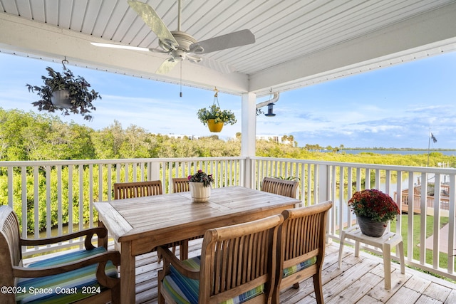 5280 95th St, Sebastian, FL 32958 - wooden terrace featuring ceiling fan and outdoor dining area