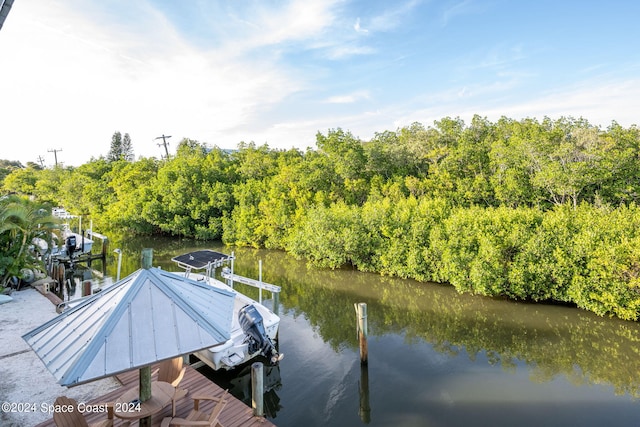 5280 95th St, Sebastian, FL 32958 - dock with a water view and view of scattered trees